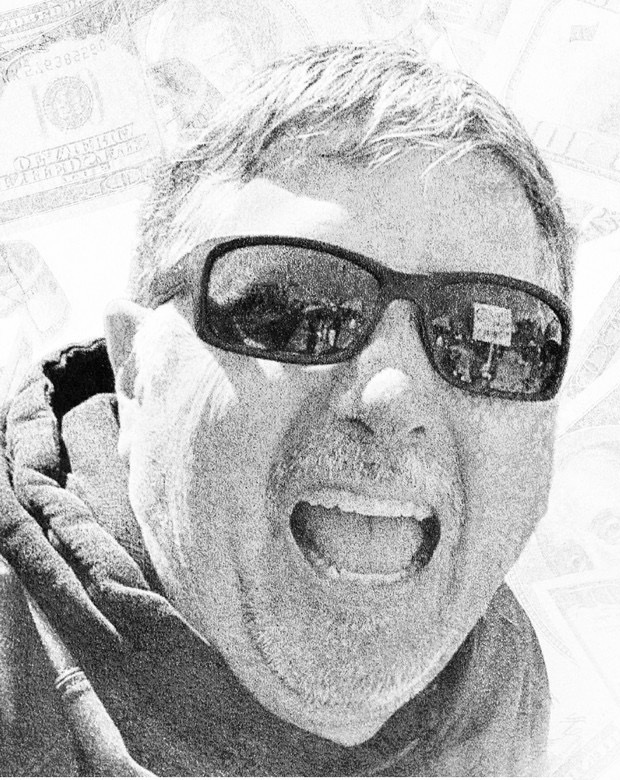 Black-and-white portrait of Kevin Grover wearing sunglasses from the supplied mailer